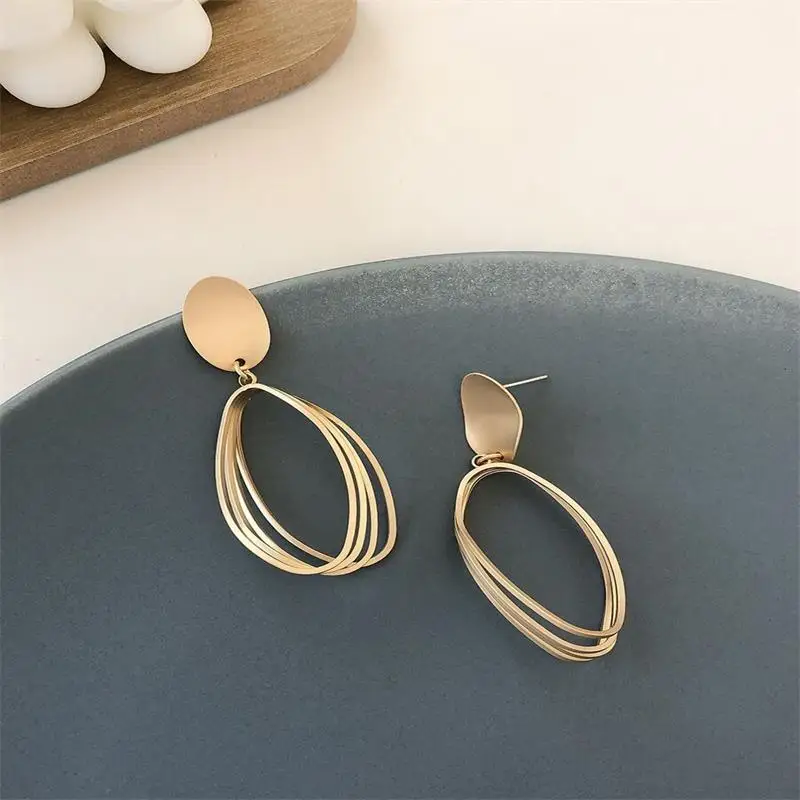 

European and American 925 silver needle matte gold earrings with hollow metal texture jewelry earrings