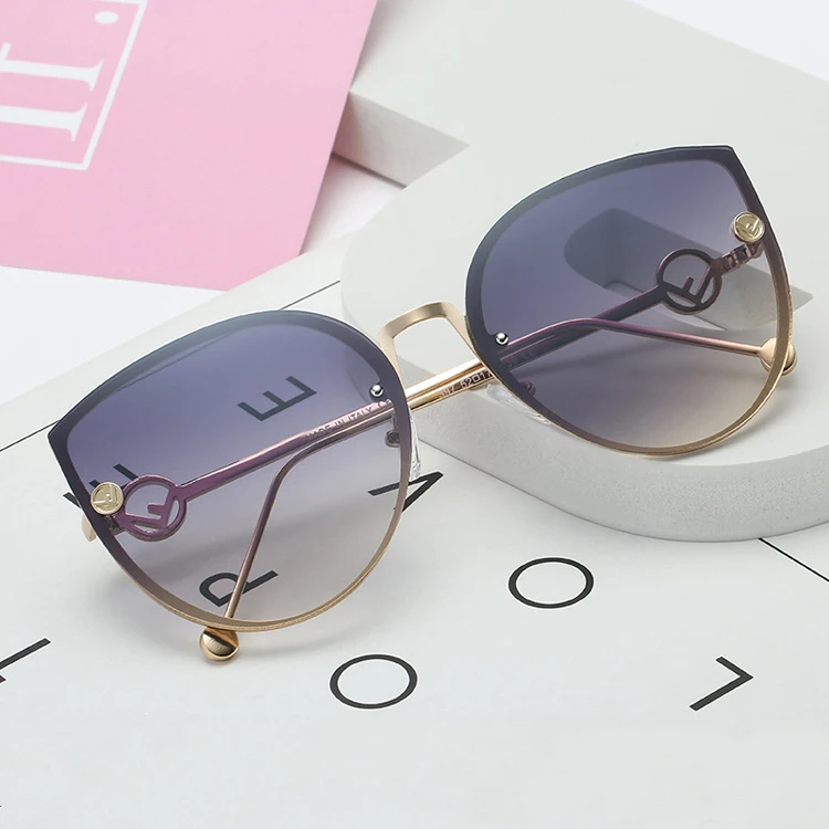 

DOISYER custom logo Stylish new cat-eye metal rimless retro women sunglass river optical designer love&roses sunglasses