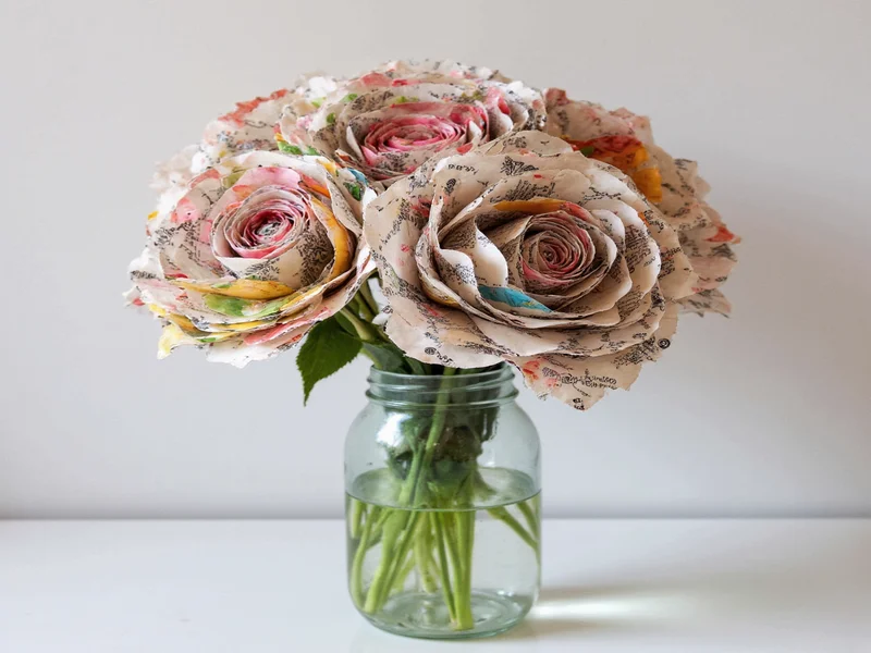 Recycled magazine paper flowers in mason jar
