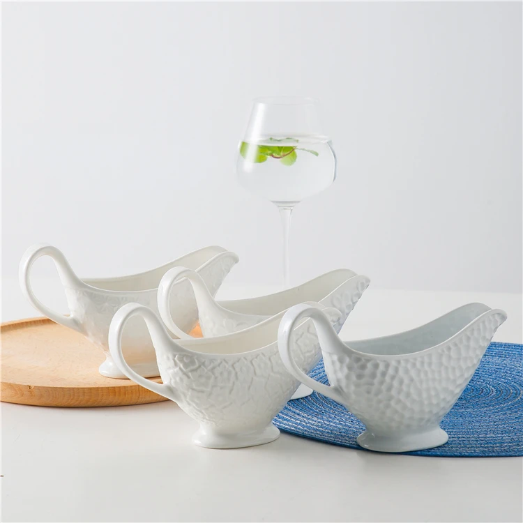 
Unique japanese restaurant spice container seasoning jug custom cheap large white ceramic sauce gravy boat 