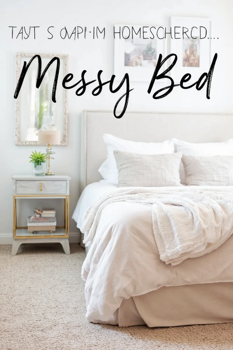Bed styled with oversized throw blanket and matching pillows.