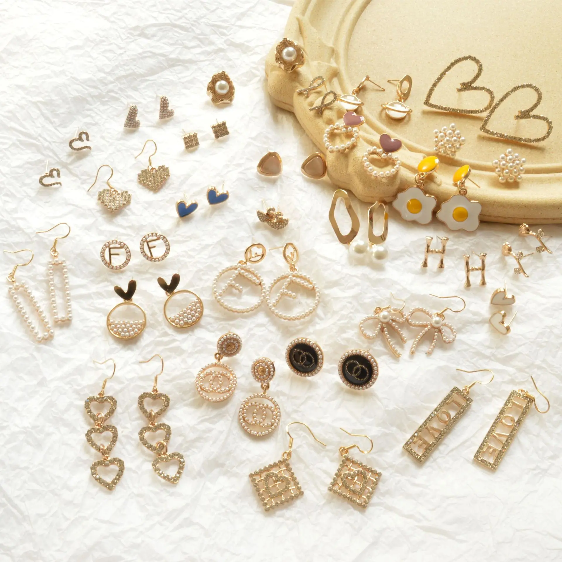 

2021 trendy hoop earrings new youthway instagram simple baroque irregular real gold plated freshwater pearl earrings