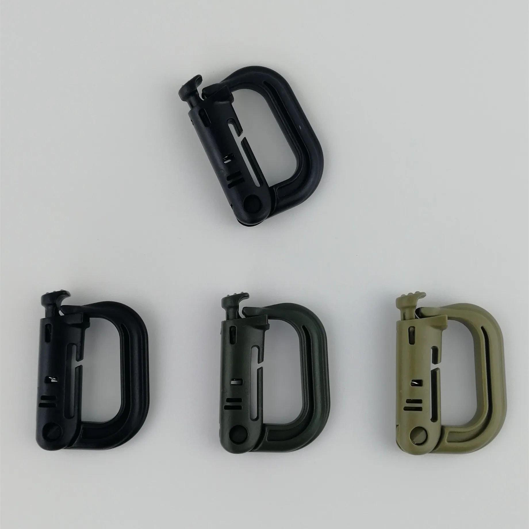 

Multipurpose plastic tactical D-Ring locking for molle webbing, Black/tan/green