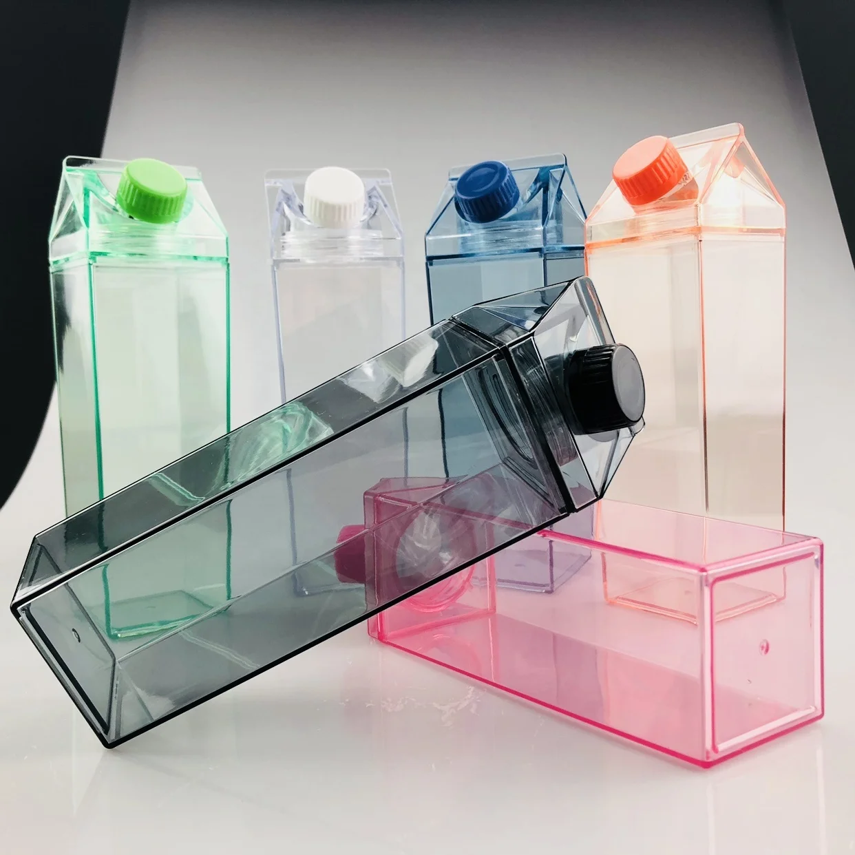

Hot selling BPA-free 500ml acrylic plastic transparent clear milk carton water bottle with lid
