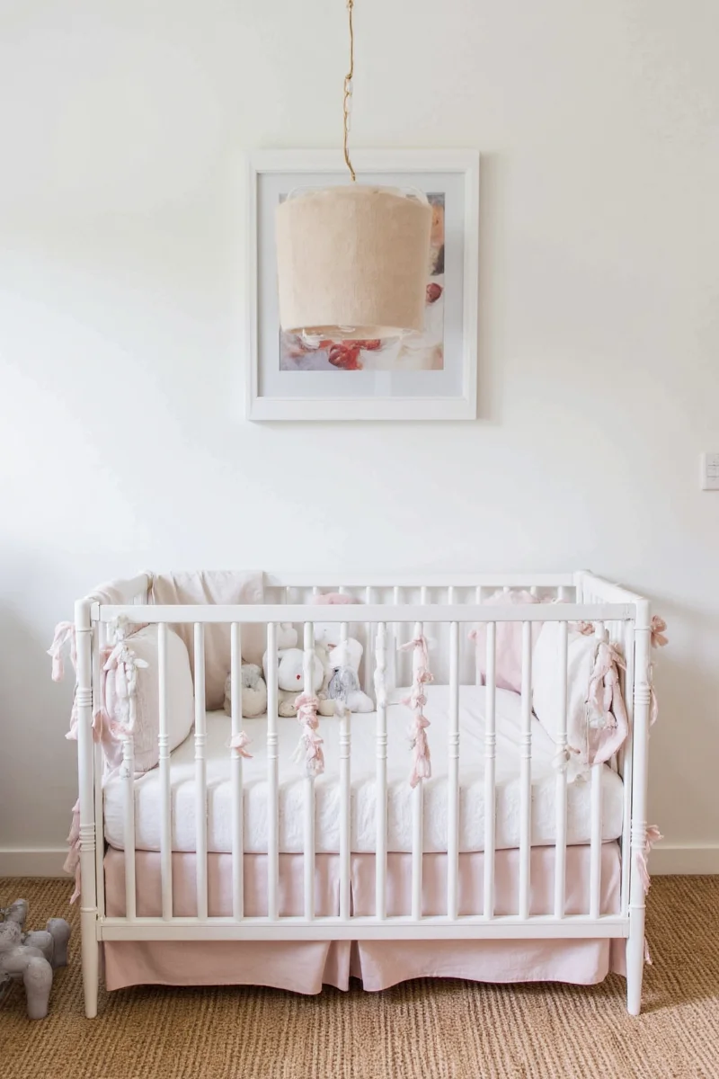Small nursery with wall-mounted crib