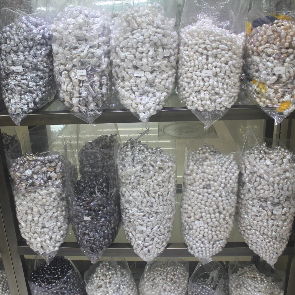 
wholesale bulk natural pearls for craft,rice ,baroque pearls,keshi ,round ,all pearls available 