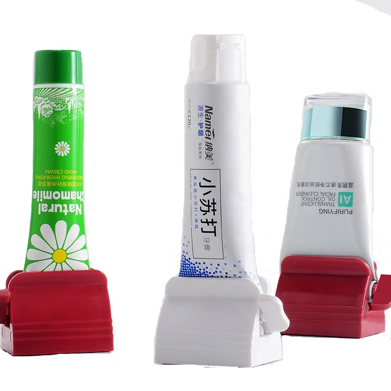 

Wholesale Travel Plastic Rolling Tube Toothpaste Squeezer Bathroom Set Accessories can customize the logo, White red