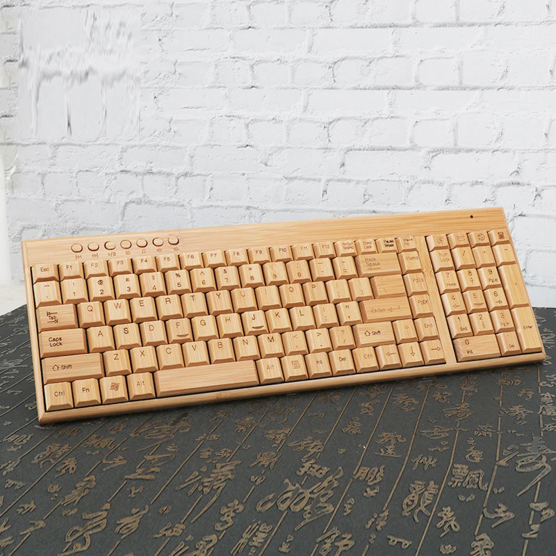 

Portable 2.4g Wireless Connection Laser Bamboo Wireless Gaming Keyboard Gaming