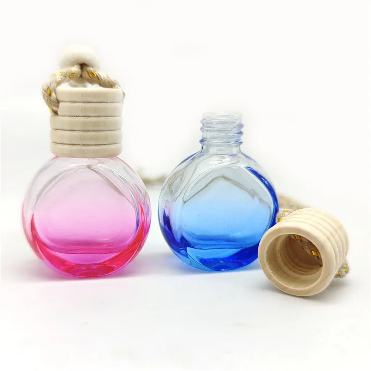 

Wholesale 10ml empty air freshener diffuser car hanging perfume bottles with wooden cap