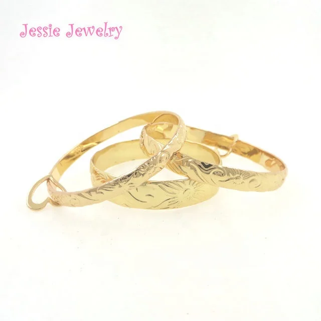

H550 gold hawaiian bangle bracelet traditional heirloom plumeria wave bracelet, Hemilton gold/silver