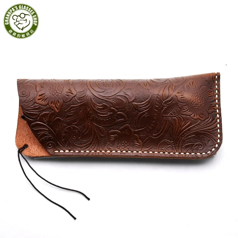 

Hot sell handmade embossing real leather glasses case Fashion cowhide pouches glasses bag Portable storage sunglass soft case