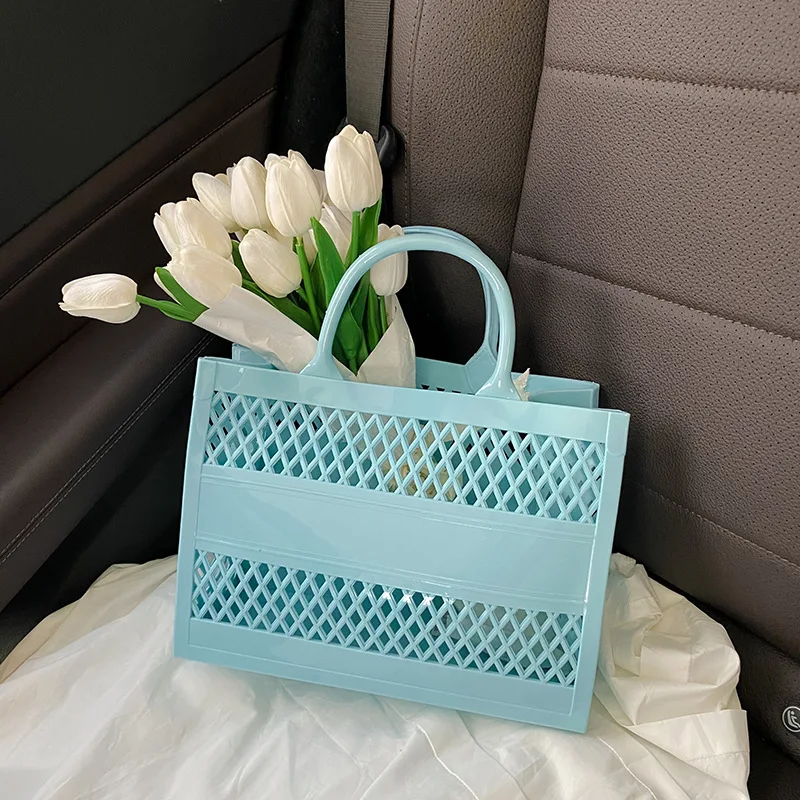 

Summer fashion women handbag hollow out tote hand bag custom beach bags 2023