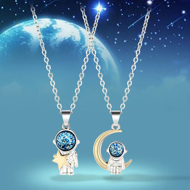 

Wholesale 2pcs/set Stars and Moon Spaceman Astronaut Couple Lover BFF Pendant Necklace for Couple Lover