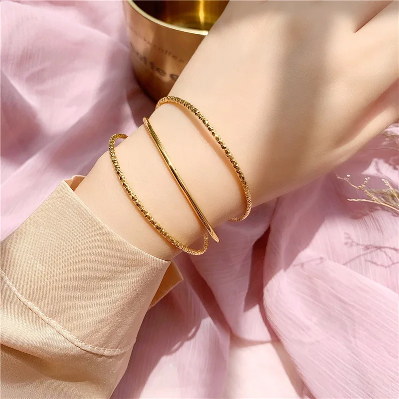 

Fashion Temperament 18K Gold Plated Bracelet Gold Tinkle Bell Hollow Ball Pendant Multi Layer Charm Bracelet