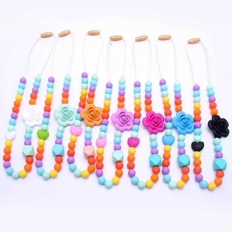 

Hot sale nursing toys food grade flower silicone baby soft chewing teething necklace, As picture show