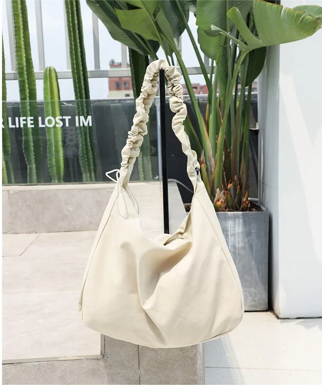 

Custom large capacity canvas handbag casual drawstring plain single shoulder bag fashion crossbody bag wholesale, Customized