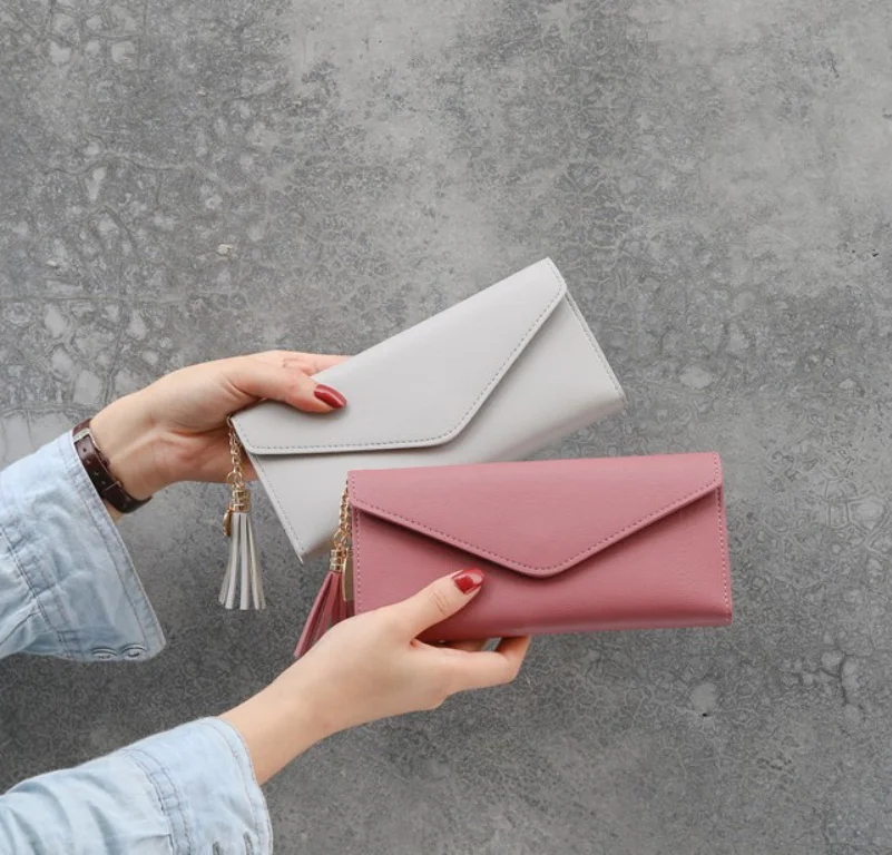 

Factory supply Wholesale Women's long heart-shaped pendant simple fashion tassel wallet