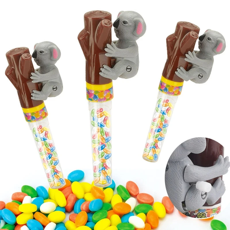 набор игрушечных конфет. конфеты с игрушкой. новогодний подарок конфеты в мягкой игрушке. сладкий подарок на новый год. плюшевый мишка с конфетами.