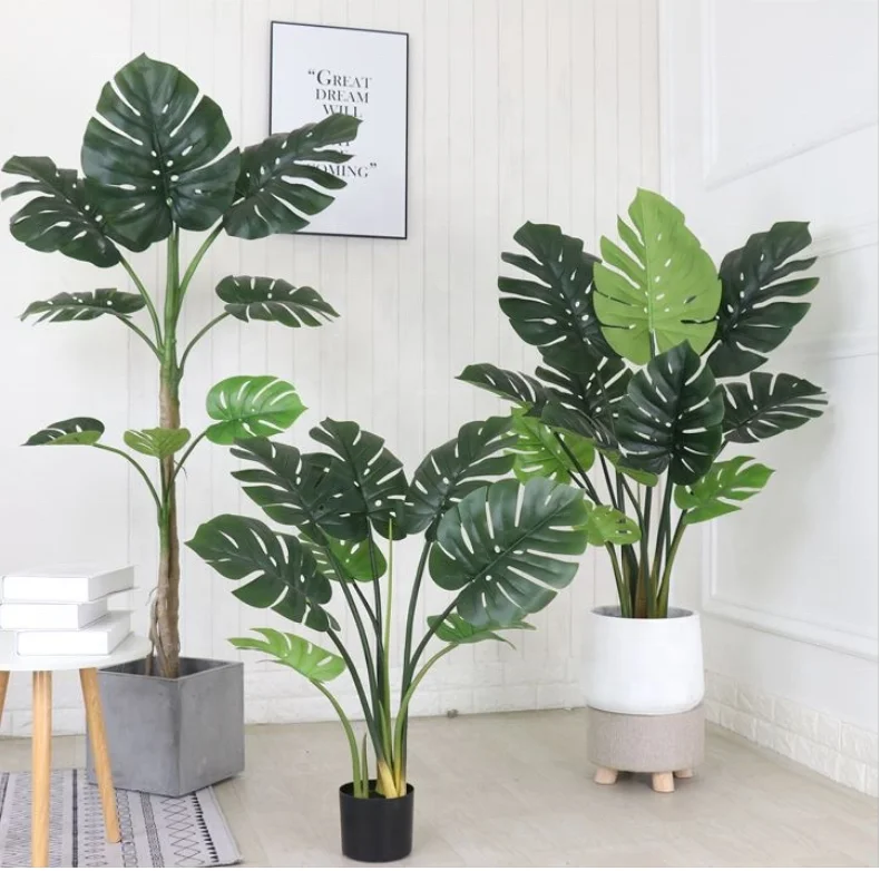 

Nataural real touch 10 leaves plastic artificial 60cm high monstera leaves potted tree split philo leaves indoor tree in pot