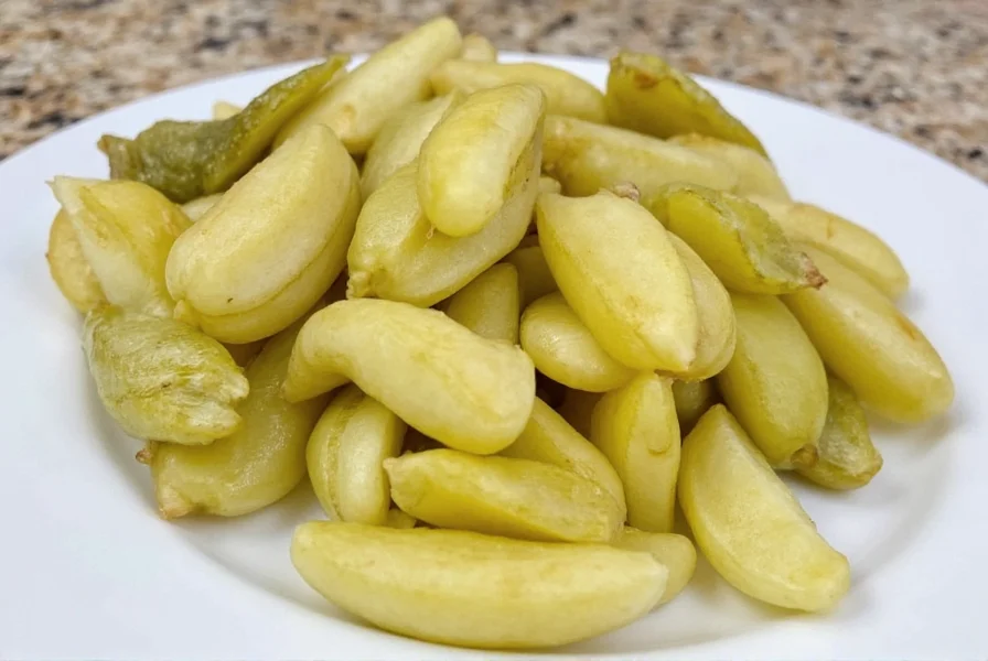 Finished pickled ginger served alongside sushi on a traditional Japanese plate