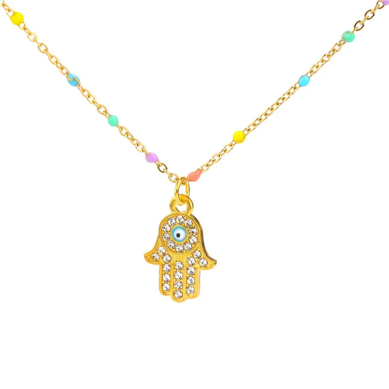

CZ Micro Pave Gold and Silver Plated Copper Turkish Eye Palm Charm Necklace