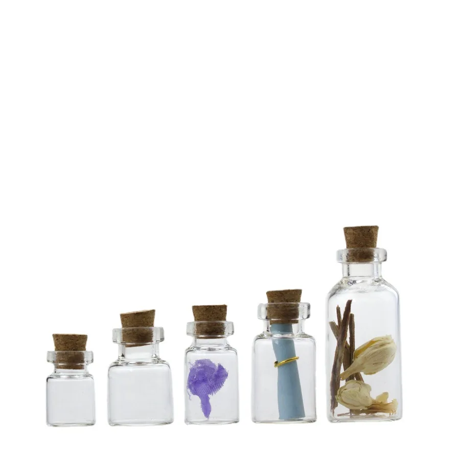 

Wholesale mini 0.5ml 1ml 2ml 3ml 5ml empty round shape transparent wishing glass bottle with cork stopper