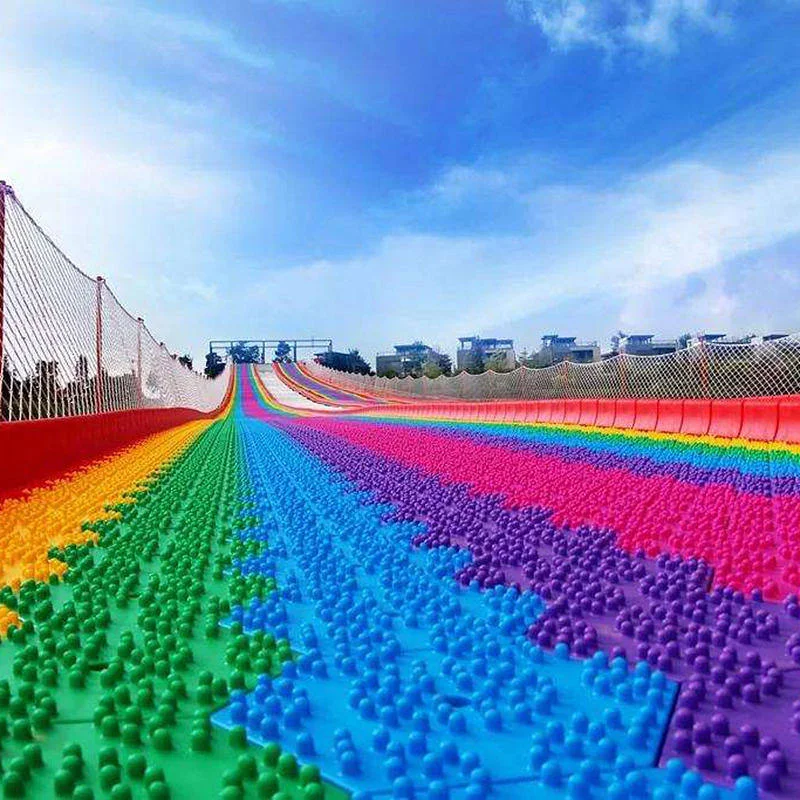 
Funny Outdoor Playground Amusement Games Children Grass Sliding Way Rainbow Dry Snow Slide For Sale 