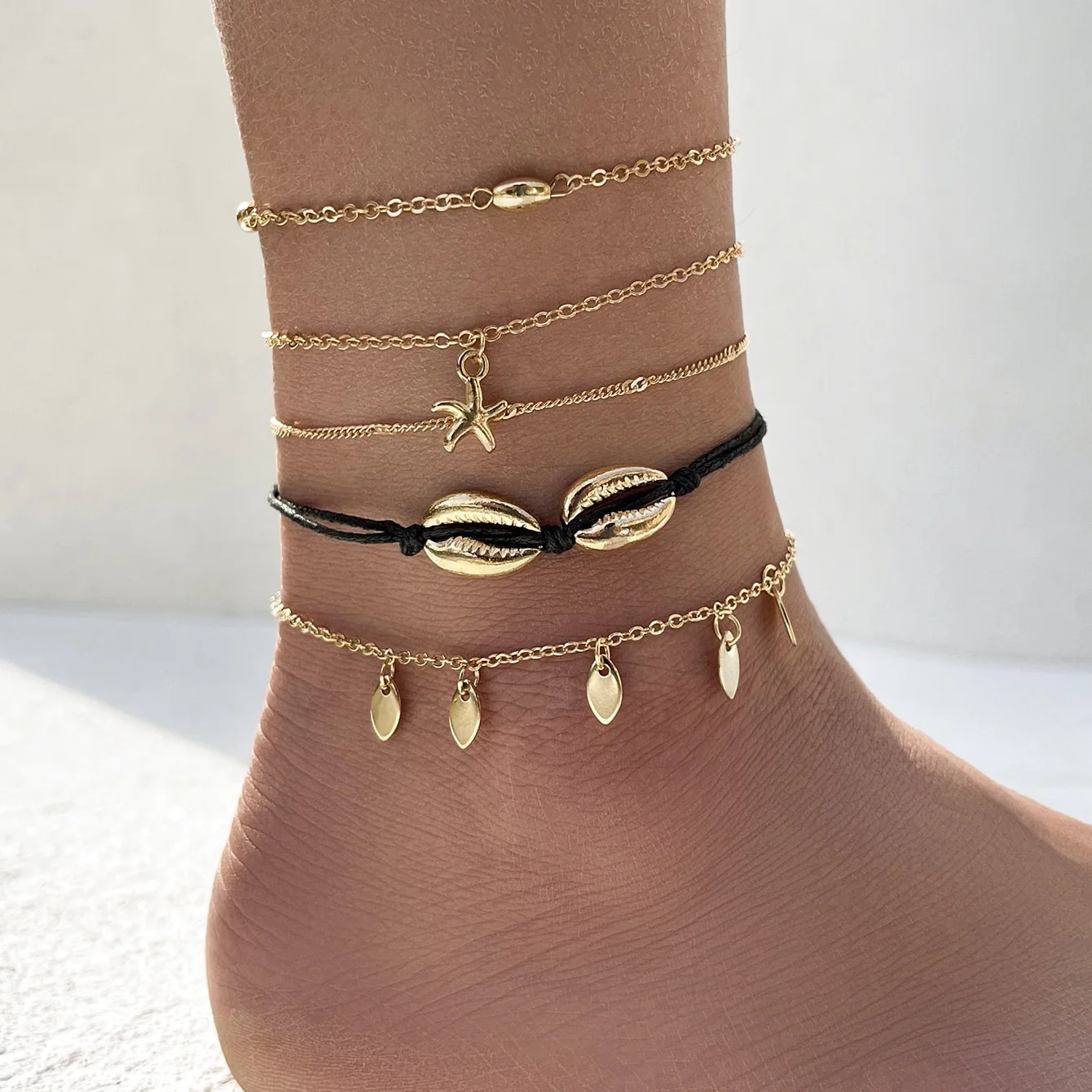

Sindlan Gold Bohemian Tassel Shell Anklets Multi Layer 5pcs/Set Anklet Foot Jewelry For Women, As picture shows