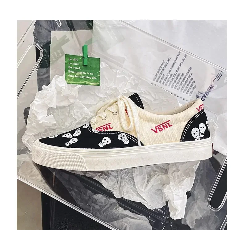

Dropshipping outdoor fashion classic canvas men sneakers human skul graffiti hip hop canvas trendy flat van canvas shoes