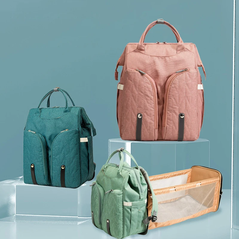 

Wholesale Portable Waterproof water proof tote diaper bag 3 in 1 baby diaper bag