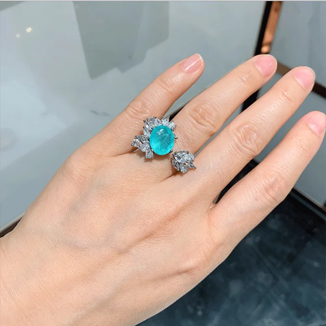 

Brand New Luxury Party Jewels Bling Cubic Zirconia Wedding Band Blue Paraiba Tourmaline Rings Synthetic Emerald Open Ring, As picture