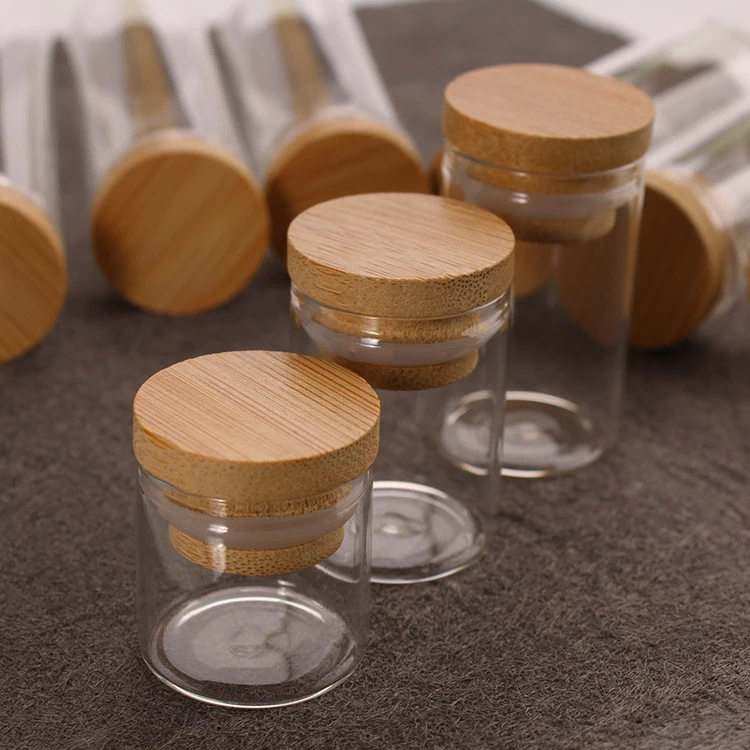 

Selling 50ml small glass bottle with rubber seal glass jar with bamboo lid set, Transparent