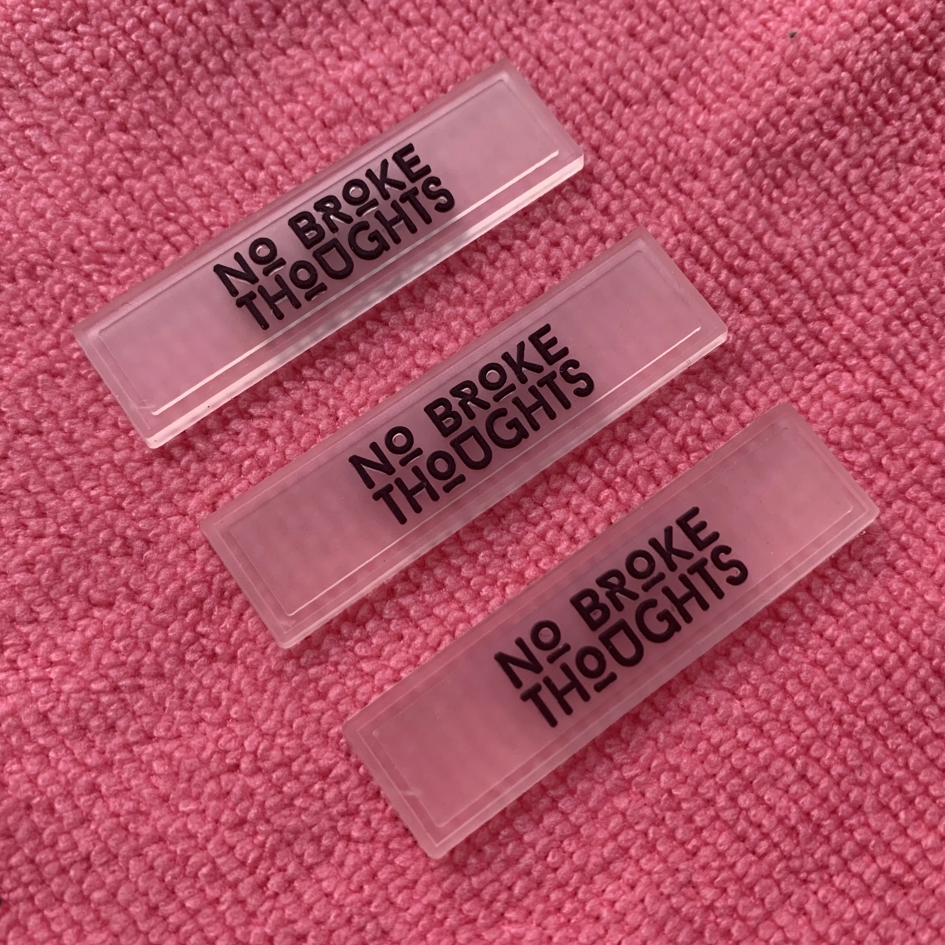 Waterproof Sewing on Transparent Rubber Label for Swimwearembossed logo PVC Clothing Label for Bikini