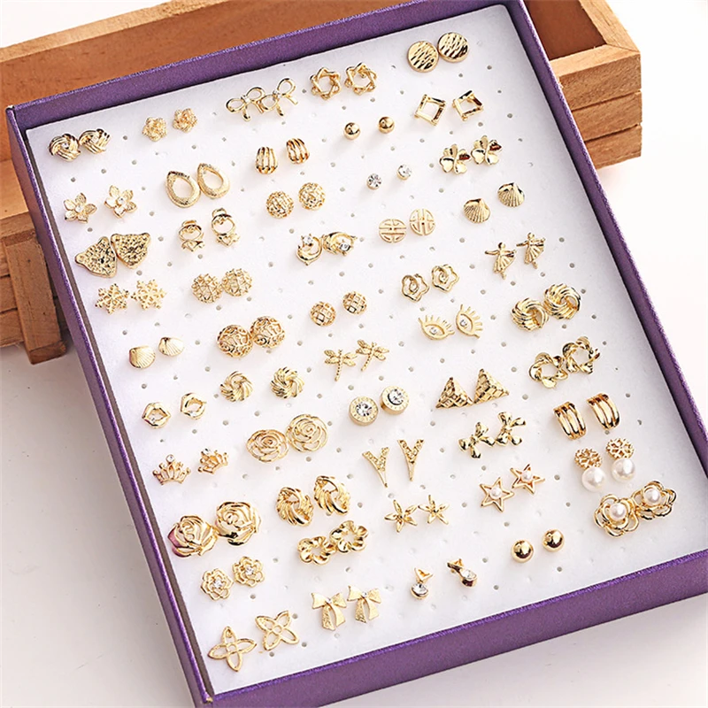 

Aug jewelry 50 pairs of boxes mixed wholesale all kinds of small gold earrings hollow hypoallergenic ladies mix earrings, Picture shows