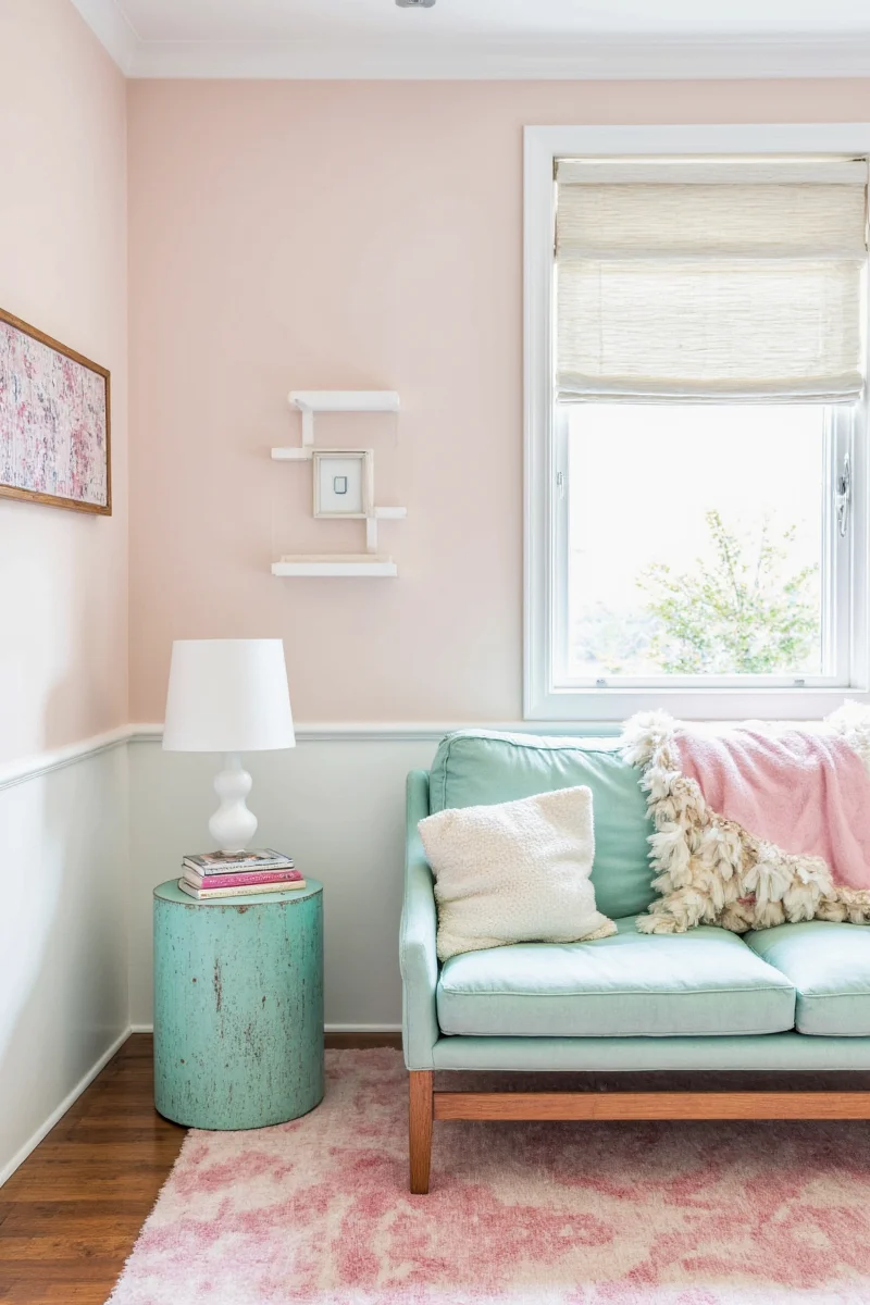Dining room with mint pink accent wall