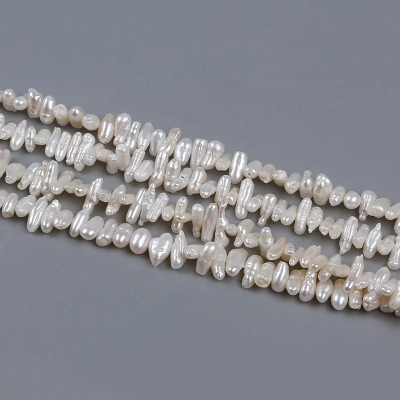 

China natural 3-4.5mm freshwater white long shape biwa pearls loose strand