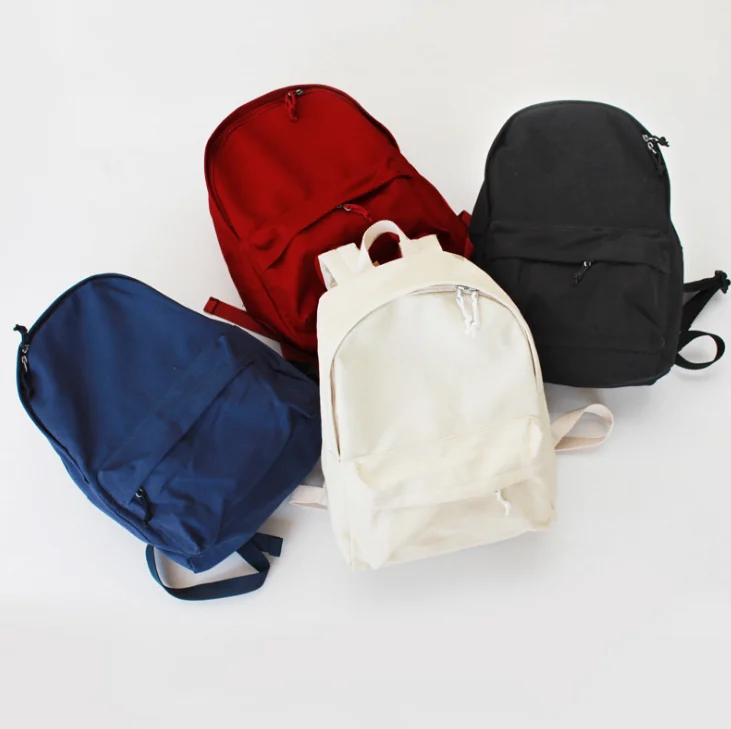 

Wholesale cheap unisex canvas cotton backpack school bag
