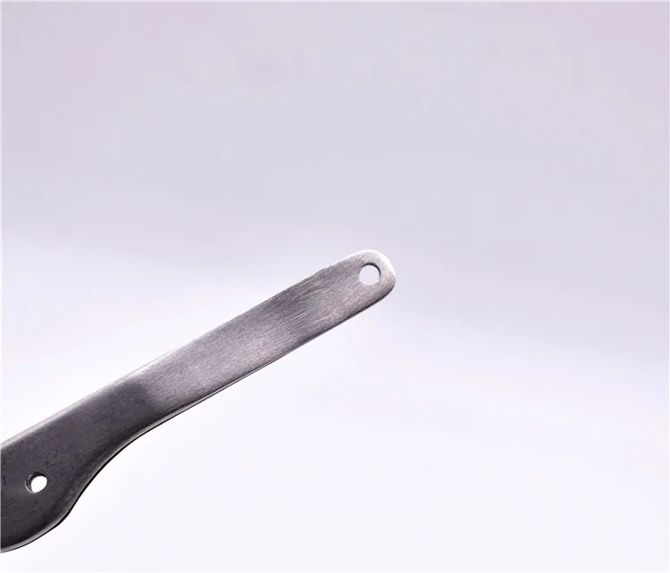 Tweezers with holes