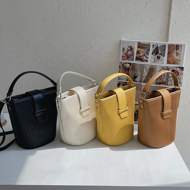 

South Korea's new products women's fashion trend handbag creative design one-shoulder cross-body bag pleated striped bucket bag