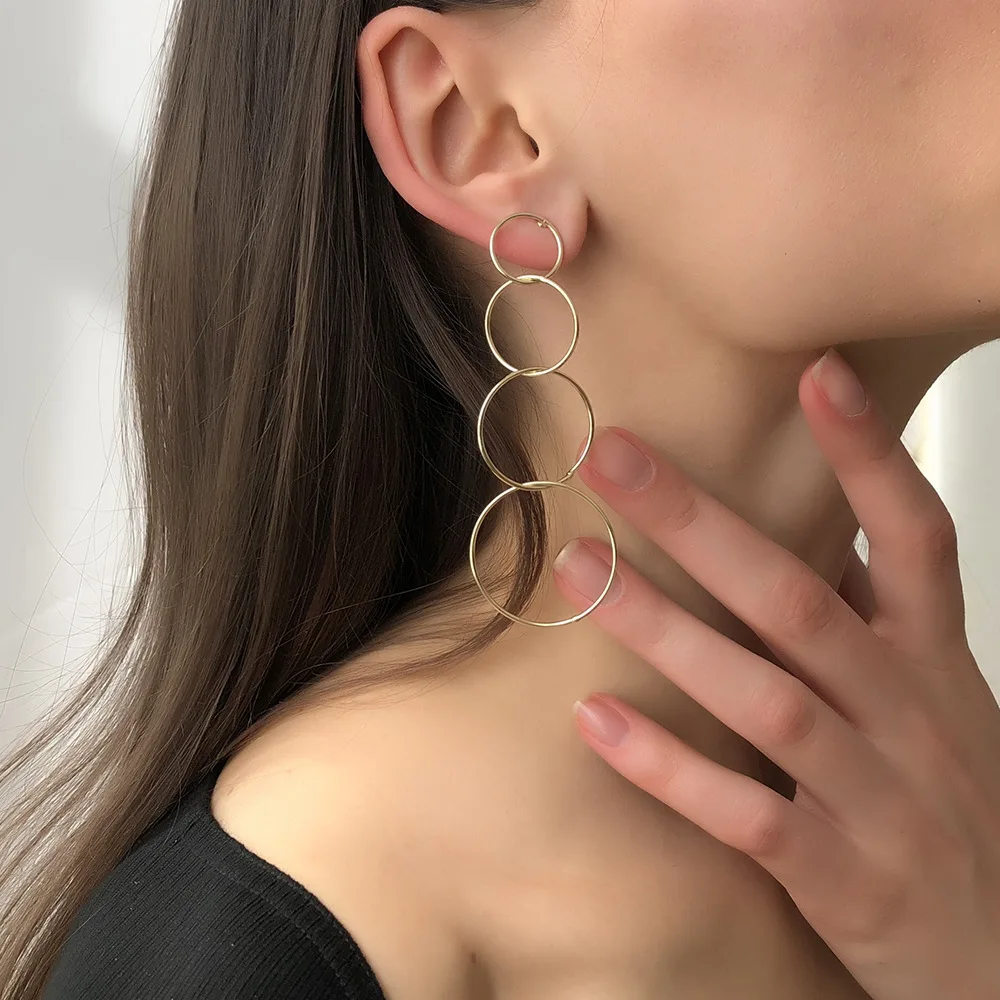 

Kaimei amazon top seller long circle earrings Simple and exaggerated metal earrings geometric fashion round knot drop earrings, Many colors fyi