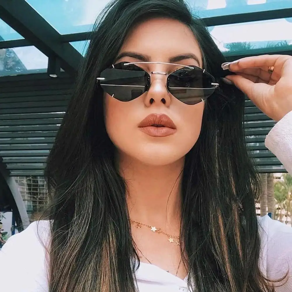 

unisex frameless small size fashionable retro modern irregular sunglasses