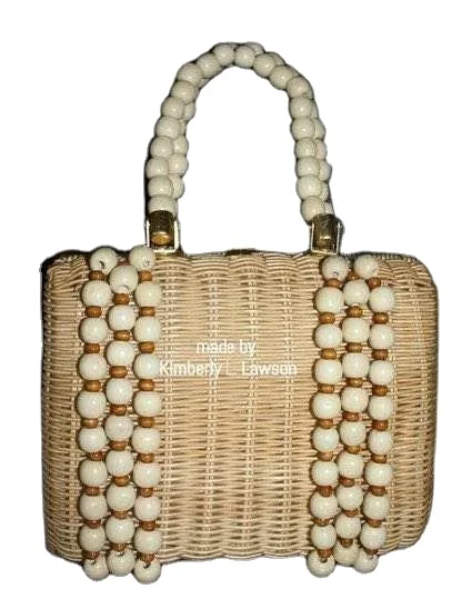 

OEM service manufactory offer handmade rattan basket and bead beach straw bag
