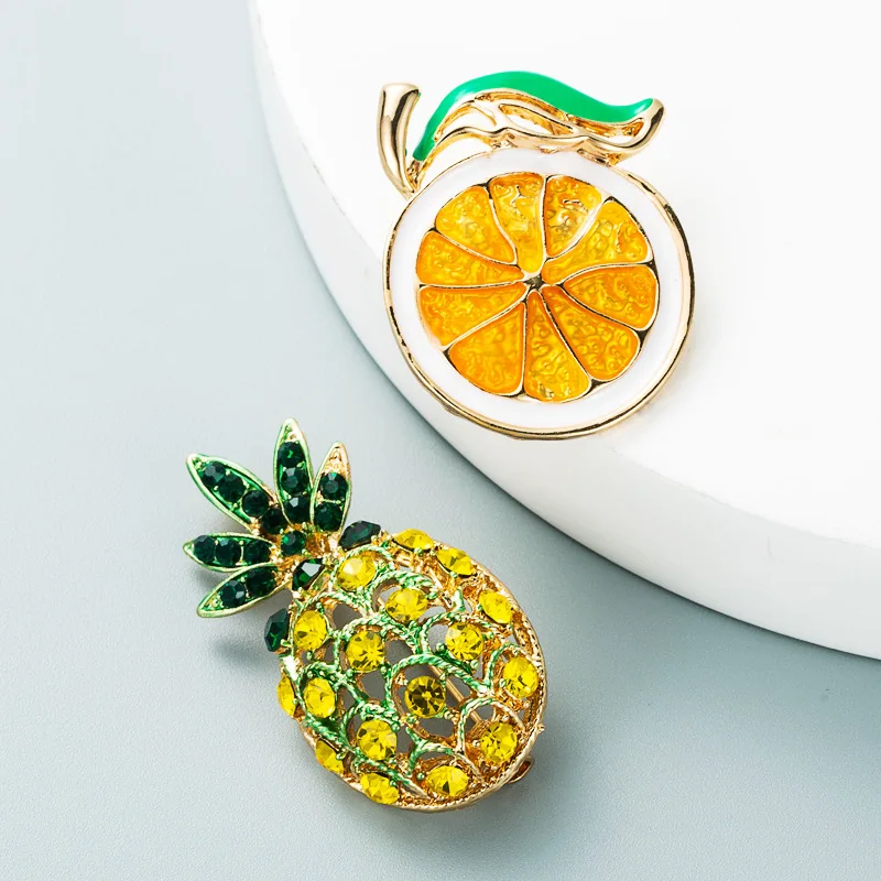 

Jachon Personality Creative Pineapple Lemon Brooch Alloy inlaid with Diamond Drop Oil Brooch Matching accessories For Girls, Same as the pic