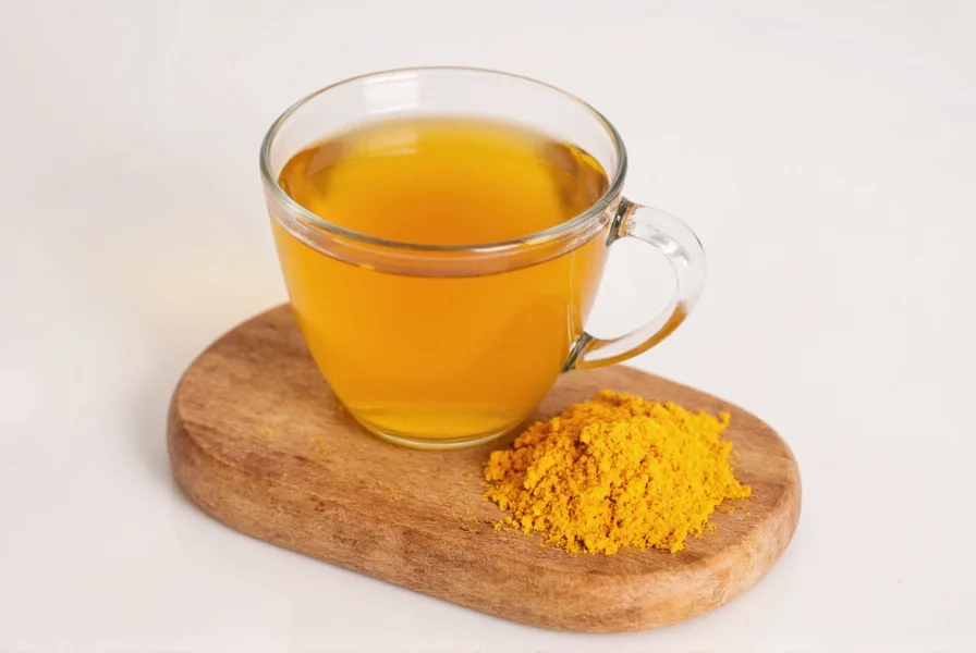 Fresh turmeric root and ingredients for homemade turmeric tea