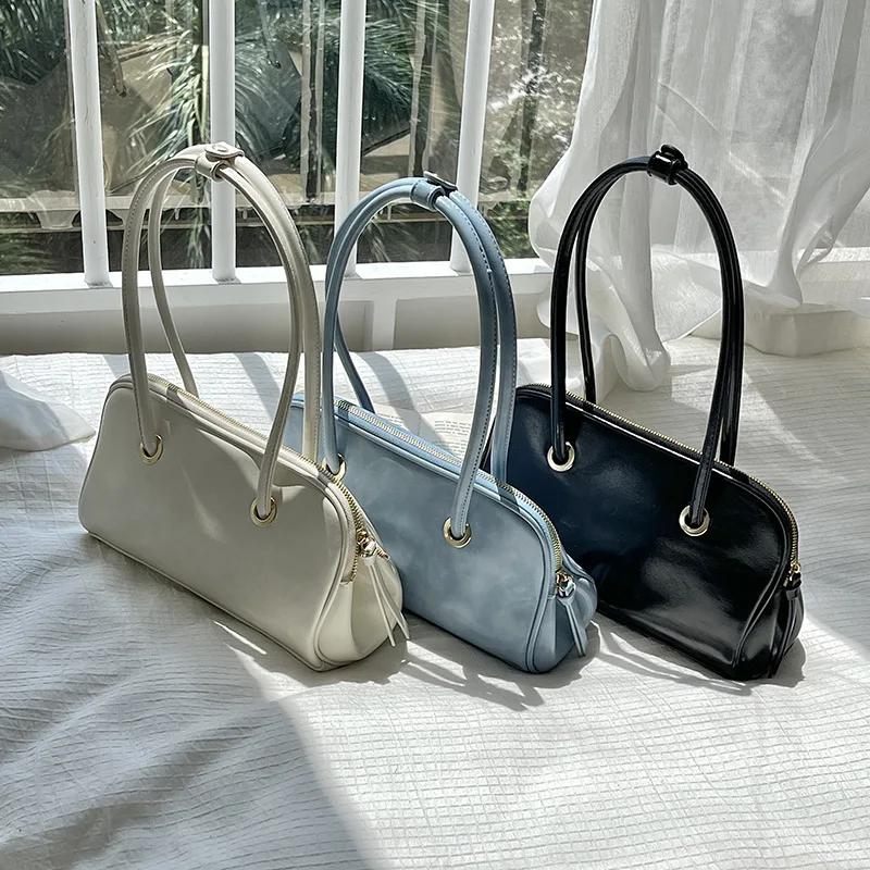 

Korean new fashion trend handbag elegant unique shoulder bag simple PU leather armpit bag wholesale