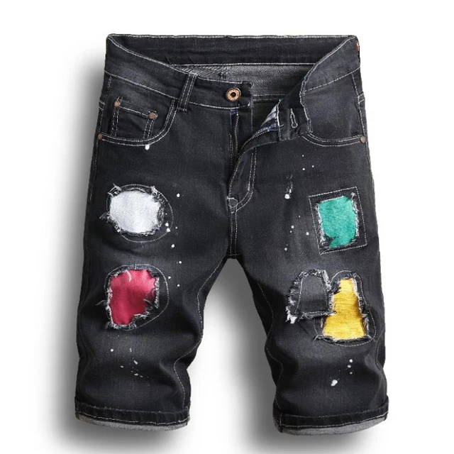 

Short Jeans Men 2021 New Trending Charater Ragged Ripped Shorts Denim Jeans Badge Personalized Spray Paint Straight Shorts