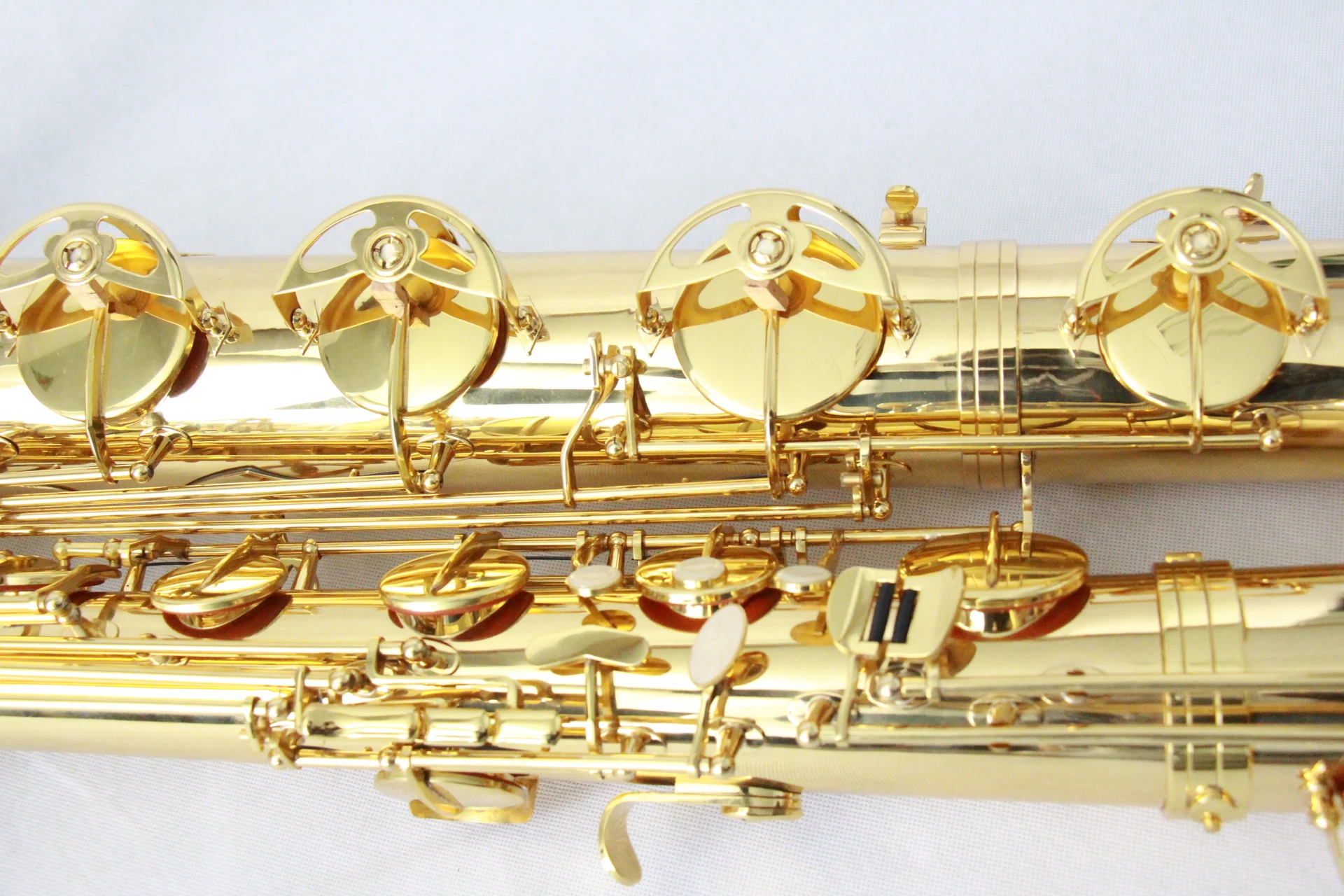 
High quality Professional Brass material Gold Lacquer Eb tone Baritone Saxophone 