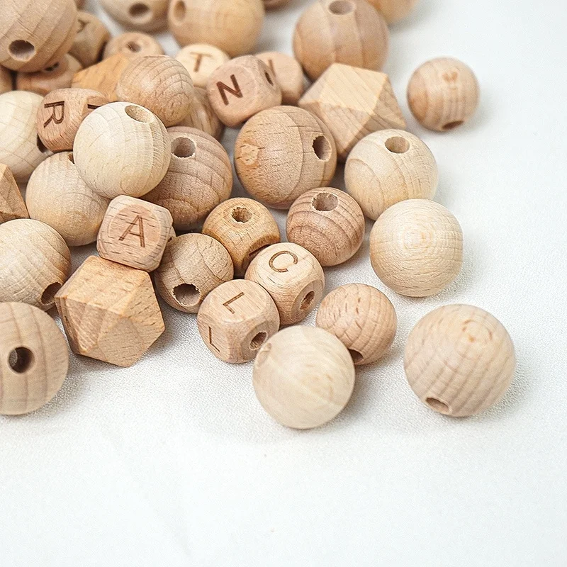 

Wholesale Loose Beech Wood Ring Wooden Round Beads Teething For Jewelry Making