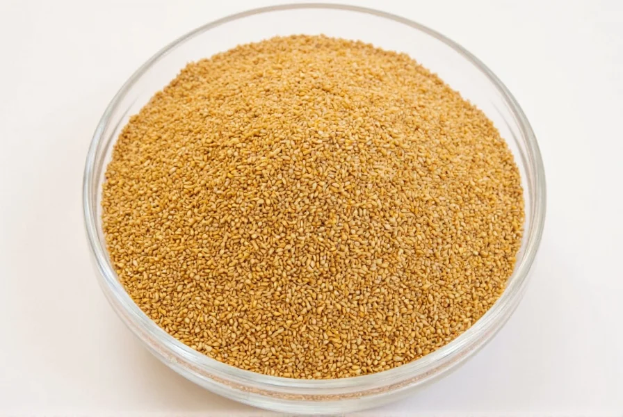 Close-up photograph of golden-brown fenugreek seeds scattered on wooden surface with measuring spoon