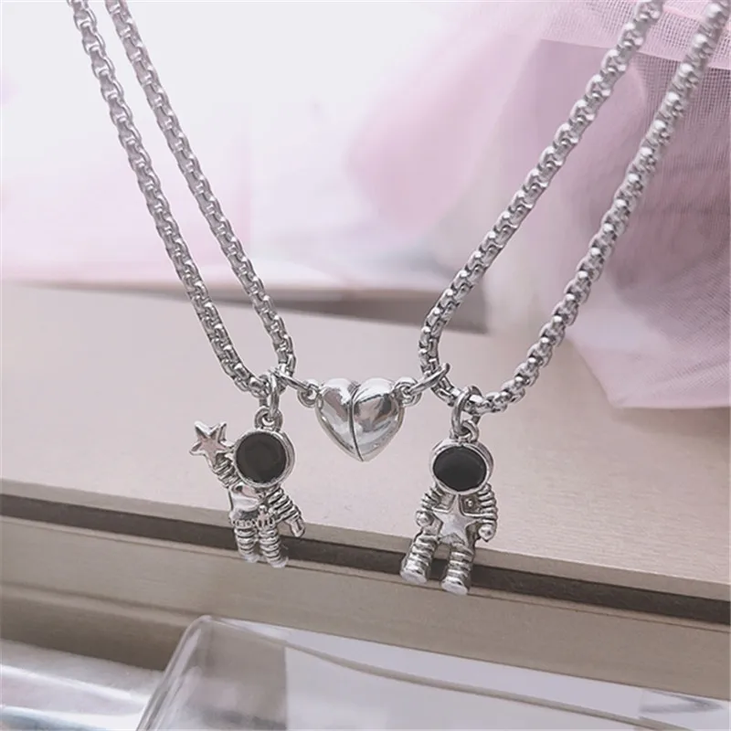 

Wholesale Trendy Magnetic Colorful Astronaut Heart Matching BFF Best Friend Magnet Valentine's Day Gift Couple Necklaces 2022, Picture shows